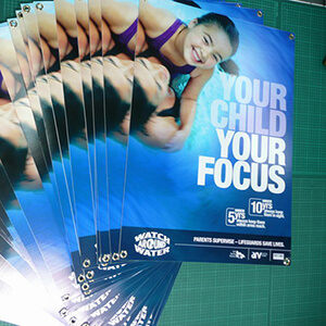 eyeleting corflute sign